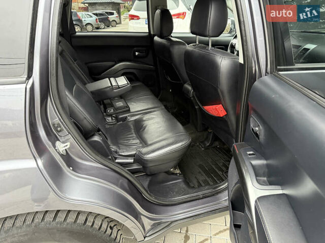 Сірий Міцубісі Аутлендер, об'ємом двигуна 2 л та пробігом 237 тис. км за 8999 $, фото 42 на Automoto.ua