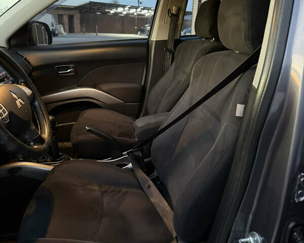 Серый Мицубиси Аутлендер, объемом двигателя 2.4 л и пробегом 210 тыс. км за 8300 $, фото 33 на Automoto.ua