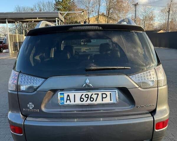 Серый Мицубиси Аутлендер, объемом двигателя 2.18 л и пробегом 287 тыс. км за 10200 $, фото 5 на Automoto.ua