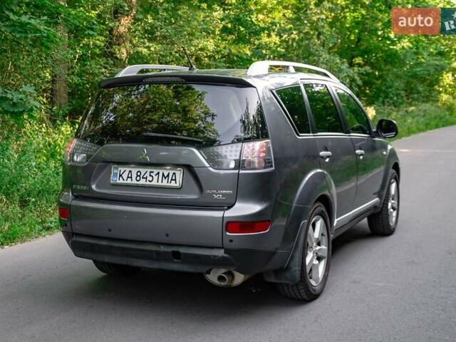 Серый Мицубиси Аутлендер, объемом двигателя 2.4 л и пробегом 280 тыс. км за 8000 $, фото 4 на Automoto.ua