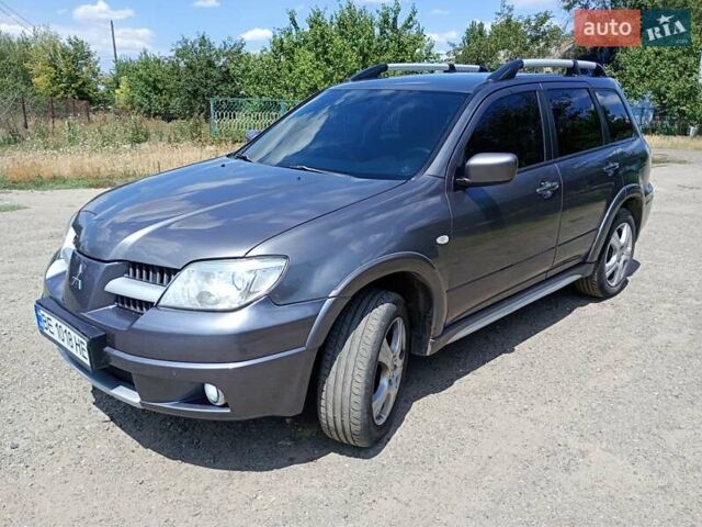 Серый Мицубиси Аутлендер, объемом двигателя 2.35 л и пробегом 342 тыс. км за 6900 $, фото 10 на Automoto.ua
