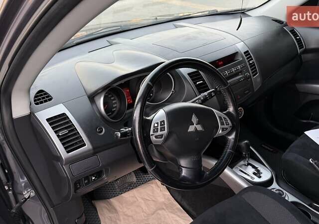 Серый Мицубиси Аутлендер, объемом двигателя 2.4 л и пробегом 174 тыс. км за 9599 $, фото 15 на Automoto.ua