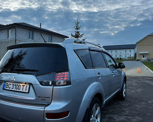 Сірий Міцубісі Аутлендер, об'ємом двигуна 2.4 л та пробігом 273 тис. км за 8400 $, фото 1 на Automoto.ua