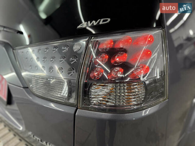 Сірий Міцубісі Аутлендер, об'ємом двигуна 2 л та пробігом 235 тис. км за 8950 $, фото 20 на Automoto.ua