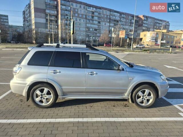 Сірий Міцубісі Аутлендер, об'ємом двигуна 2 л та пробігом 247 тис. км за 5600 $, фото 4 на Automoto.ua