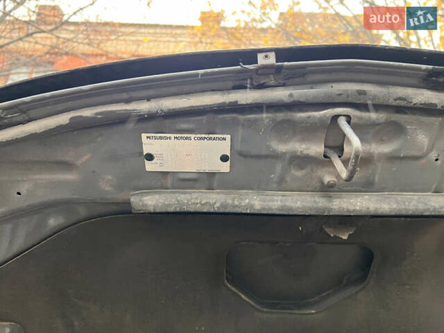 Сірий Міцубісі Аутлендер, об'ємом двигуна 3 л та пробігом 209 тис. км за 9800 $, фото 48 на Automoto.ua