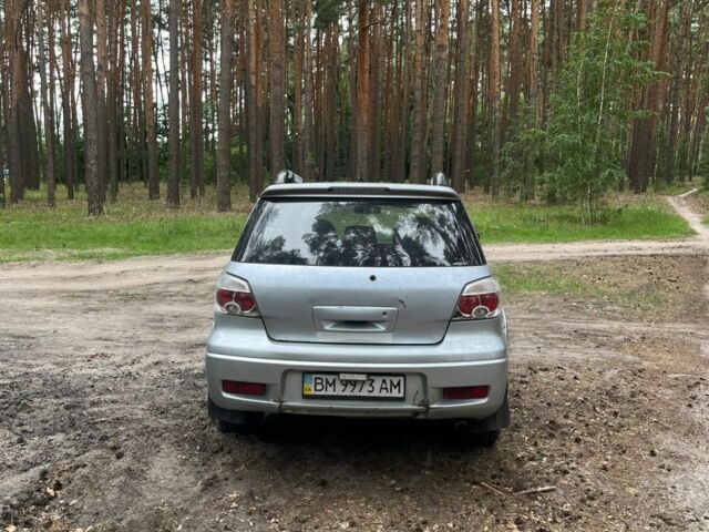 Серый Мицубиси Аутлендер, объемом двигателя 2.4 л и пробегом 225 тыс. км за 6500 $, фото 2 на Automoto.ua