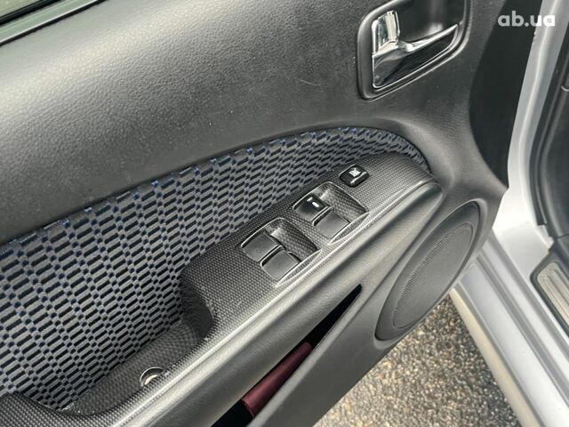 Серый Мицубиси Аутлендер, объемом двигателя 2.4 л и пробегом 324 тыс. км за 6890 $, фото 27 на Automoto.ua