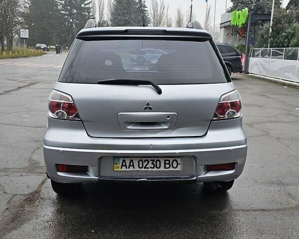 Сірий Міцубісі Аутлендер, об'ємом двигуна 2.38 л та пробігом 230 тис. км за 5400 $, фото 5 на Automoto.ua