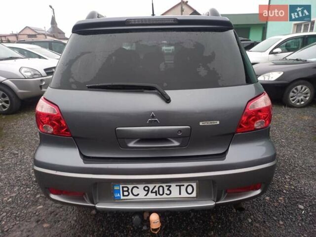 Серый Мицубиси Аутлендер, объемом двигателя 2 л и пробегом 232 тыс. км за 5950 $, фото 5 на Automoto.ua