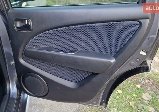 Серый Мицубиси Аутлендер, объемом двигателя 2 л и пробегом 157 тыс. км за 8300 $, фото 26 на Automoto.ua