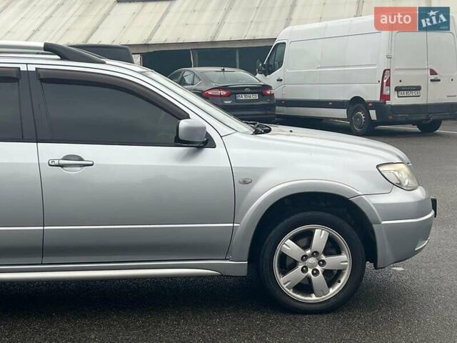 Серый Мицубиси Аутлендер, объемом двигателя 2.4 л и пробегом 324 тыс. км за 6890 $, фото 13 на Automoto.ua