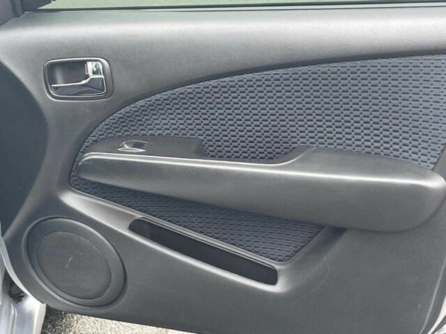 Сірий Міцубісі Аутлендер, об'ємом двигуна 2.4 л та пробігом 324 тис. км за 6890 $, фото 14 на Automoto.ua