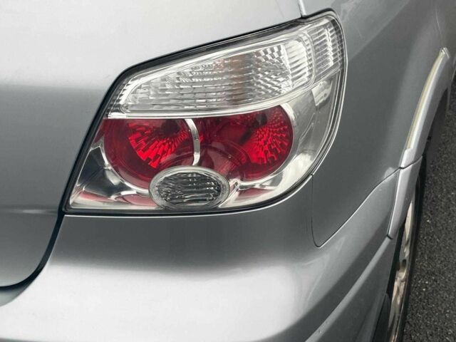 Сірий Міцубісі Аутлендер, об'ємом двигуна 2.4 л та пробігом 324 тис. км за 6890 $, фото 10 на Automoto.ua