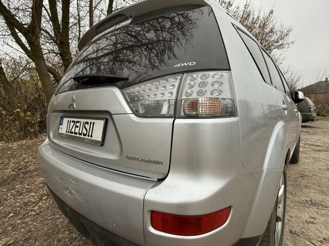 Серый Мицубиси Аутлендер, объемом двигателя 2 л и пробегом 340 тыс. км за 4000 $, фото 4 на Automoto.ua