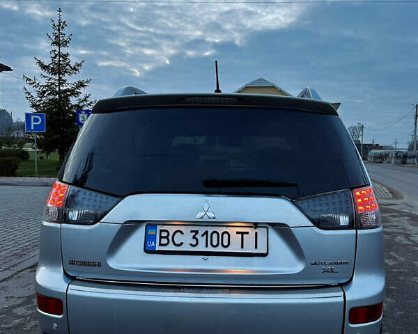 Сірий Міцубісі Аутлендер, об'ємом двигуна 2.4 л та пробігом 273 тис. км за 8400 $, фото 3 на Automoto.ua