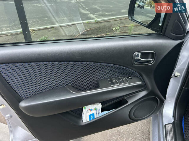 Серый Мицубиси Аутлендер, объемом двигателя 2.38 л и пробегом 81 тыс. км за 8700 $, фото 11 на Automoto.ua