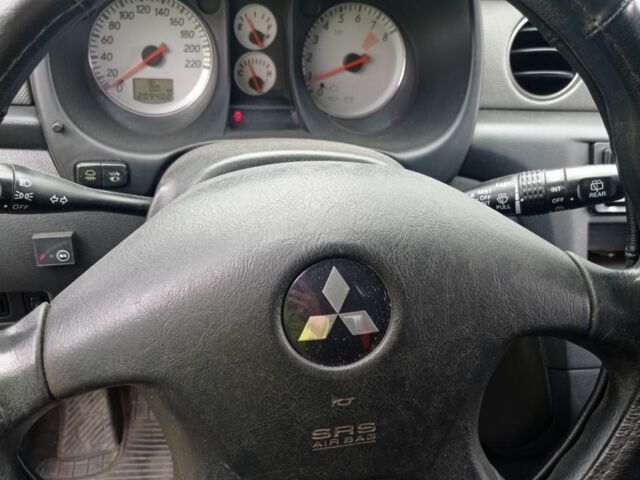 Сірий Міцубісі Аутлендер, об'ємом двигуна 2 л та пробігом 208 тис. км за 6000 $, фото 5 на Automoto.ua