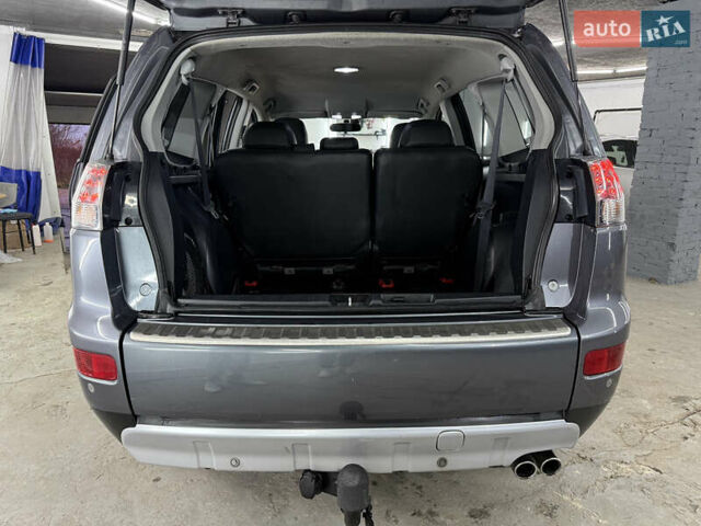 Сірий Міцубісі Аутлендер, об'ємом двигуна 2 л та пробігом 235 тис. км за 8950 $, фото 44 на Automoto.ua