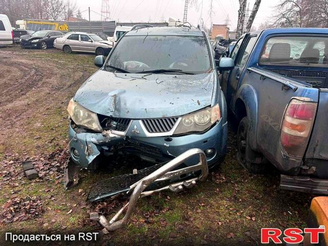 Серый Мицубиси Аутлендер, объемом двигателя 2.4 л и пробегом 205 тыс. км за 3500 $, фото 3 на Automoto.ua