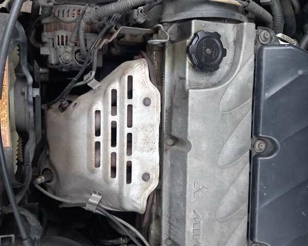 Серый Мицубиси Аутлендер, объемом двигателя 2.38 л и пробегом 143 тыс. км за 7300 $, фото 21 на Automoto.ua