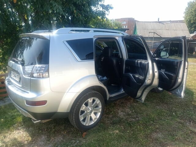 Сірий Міцубісі Аутлендер, об'ємом двигуна 2.4 л та пробігом 190 тис. км за 9200 $, фото 4 на Automoto.ua