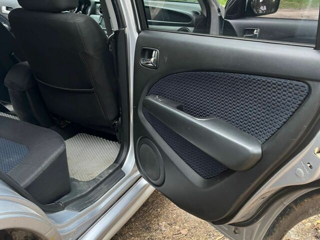 Серый Мицубиси Аутлендер, объемом двигателя 2.4 л и пробегом 225 тыс. км за 6500 $, фото 10 на Automoto.ua