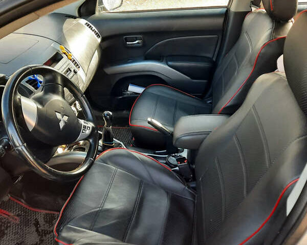 Сірий Міцубісі Аутлендер, об'ємом двигуна 2.4 л та пробігом 253 тис. км за 8900 $, фото 8 на Automoto.ua