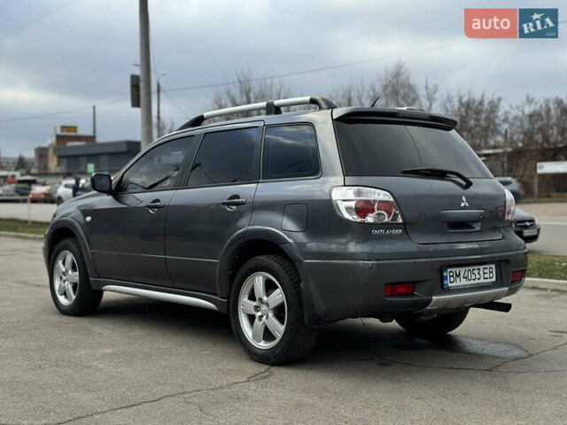 Серый Мицубиси Аутлендер, объемом двигателя 2.38 л и пробегом 254 тыс. км за 7300 $, фото 9 на Automoto.ua
