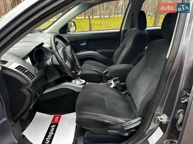 Серый Мицубиси Аутлендер, объемом двигателя 2.4 л и пробегом 237 тыс. км за 8490 $, фото 13 на Automoto.ua