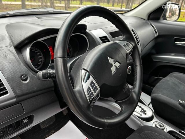 Серый Мицубиси Аутлендер, объемом двигателя 2.4 л и пробегом 237 тыс. км за 8490 $, фото 25 на Automoto.ua