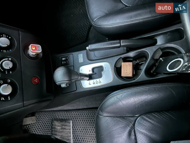 Сірий Міцубісі Аутлендер, об'ємом двигуна 2.38 л та пробігом 273 тис. км за 8000 $, фото 13 на Automoto.ua