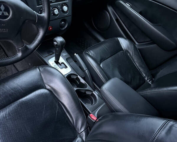 Сірий Міцубісі Аутлендер, об'ємом двигуна 2.4 л та пробігом 190 тис. км за 7500 $, фото 7 на Automoto.ua