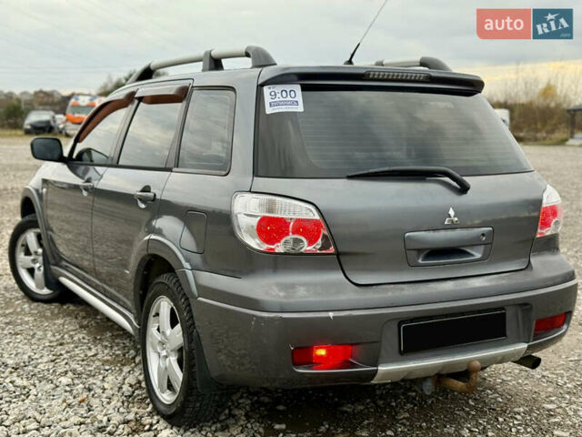 Серый Мицубиси Аутлендер, объемом двигателя 2 л и пробегом 199 тыс. км за 5999 $, фото 5 на Automoto.ua