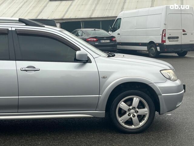 Серый Мицубиси Аутлендер, объемом двигателя 2.4 л и пробегом 324 тыс. км за 6890 $, фото 12 на Automoto.ua
