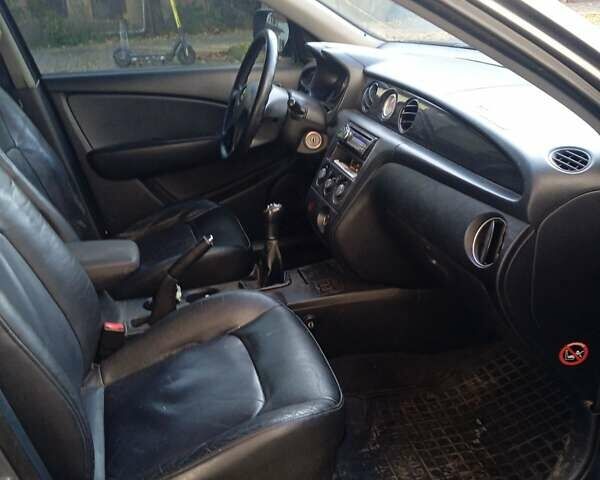 Серый Мицубиси Аутлендер, объемом двигателя 2 л и пробегом 172 тыс. км за 5900 $, фото 4 на Automoto.ua