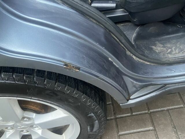 Сірий Міцубісі Аутлендер, об'ємом двигуна 2 л та пробігом 330 тис. км за 4950 $, фото 6 на Automoto.ua