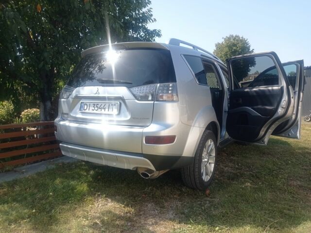 Сірий Міцубісі Аутлендер, об'ємом двигуна 2.4 л та пробігом 190 тис. км за 9200 $, фото 3 на Automoto.ua