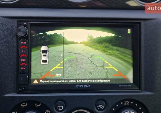 Серый Мицубиси Аутлендер, объемом двигателя 2 л и пробегом 157 тыс. км за 8300 $, фото 29 на Automoto.ua