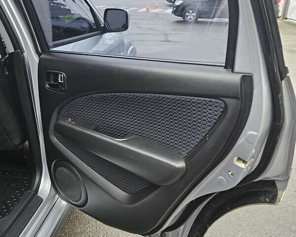 Сірий Міцубісі Аутлендер, об'ємом двигуна 2.38 л та пробігом 230 тис. км за 5700 $, фото 16 на Automoto.ua