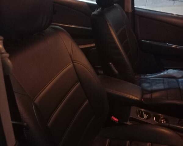 Серый Мицубиси Аутлендер, объемом двигателя 2 л и пробегом 311 тыс. км за 7100 $, фото 2 на Automoto.ua