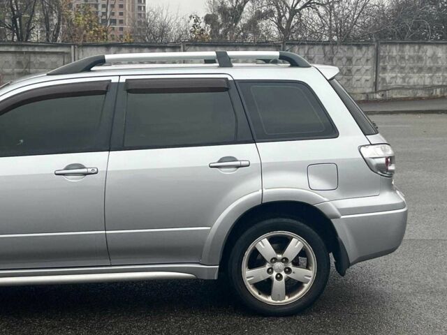 Сірий Міцубісі Аутлендер, об'ємом двигуна 2.4 л та пробігом 324 тис. км за 6890 $, фото 6 на Automoto.ua