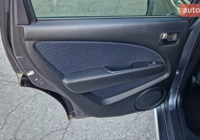 Серый Мицубиси Аутлендер, объемом двигателя 2 л и пробегом 157 тыс. км за 8300 $, фото 17 на Automoto.ua