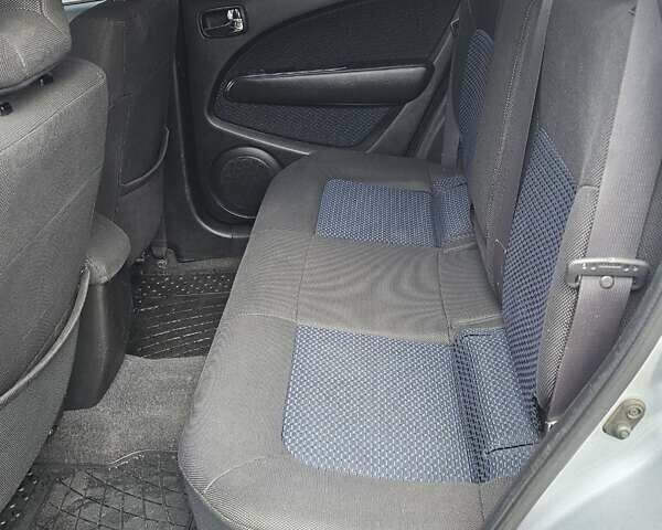 Сірий Міцубісі Аутлендер, об'ємом двигуна 2.38 л та пробігом 230 тис. км за 5500 $, фото 13 на Automoto.ua