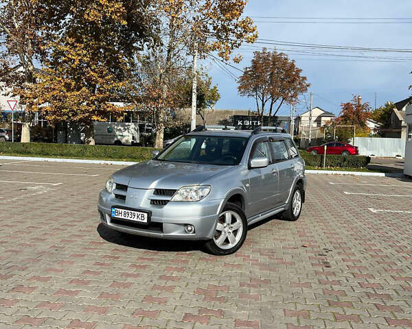 Сірий Міцубісі Аутлендер, об'ємом двигуна 2 л та пробігом 214 тис. км за 6900 $, фото 5 на Automoto.ua