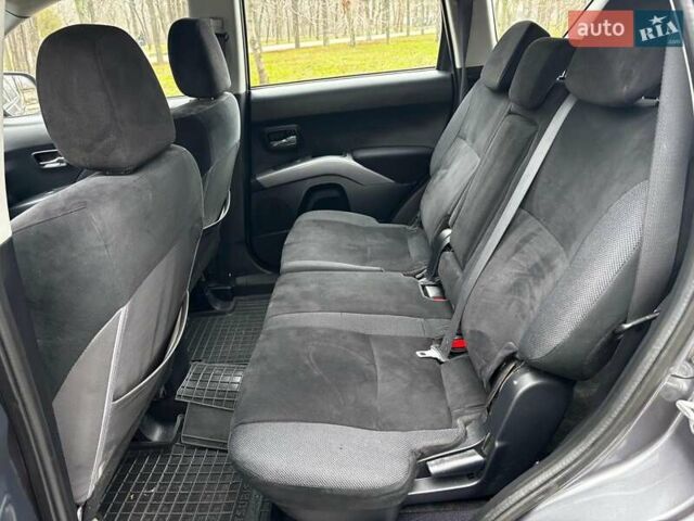 Серый Мицубиси Аутлендер, объемом двигателя 2.4 л и пробегом 237 тыс. км за 8490 $, фото 14 на Automoto.ua