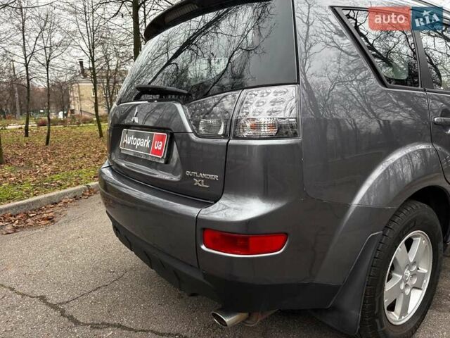 Серый Мицубиси Аутлендер, объемом двигателя 2.4 л и пробегом 237 тыс. км за 8490 $, фото 11 на Automoto.ua