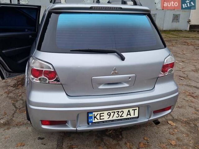 Серый Мицубиси Аутлендер, объемом двигателя 2.38 л и пробегом 113 тыс. км за 8900 $, фото 8 на Automoto.ua