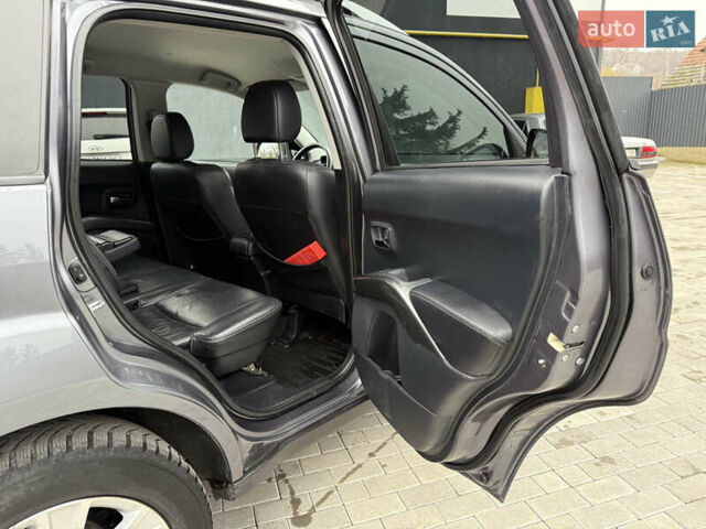 Сірий Міцубісі Аутлендер, об'ємом двигуна 2 л та пробігом 237 тис. км за 8999 $, фото 41 на Automoto.ua