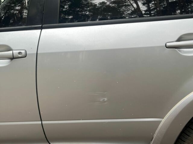 Серый Мицубиси Аутлендер, объемом двигателя 2.4 л и пробегом 225 тыс. км за 6500 $, фото 11 на Automoto.ua